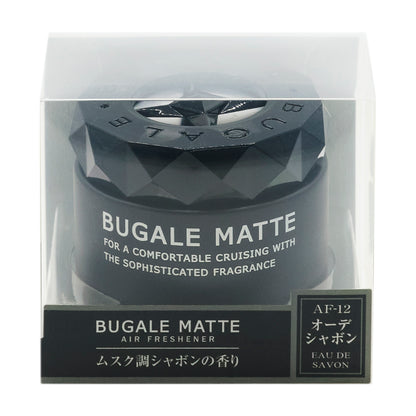 透明ケースに入った黒い容器の化粧箱の正面。BUGALE MATTE、FOR A COMFORTABLE CRUISING WITH THE SOPHISTICATED FRAGRANCE の表示。下の帯に BUGALE MATTE AIR FRESHENER「ムスク調シャボンの香り」と、AF-12 オーデシャボン EAU DE SAVON のラベル