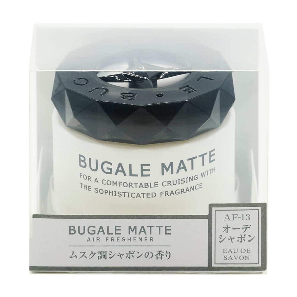 透明ケースに入った白い容器の化粧箱の正面。BUGALE MATTE、FOR A COMFORTABLE CRUISING WITH THE SOPHISTICATED FRAGRANCE の表示。下の帯に BUGALE MATTE AIR FRESHENER「ムスク調シャボンの香り」と、AF-13 オーデシャボン EAU DE SAVON のラベル
