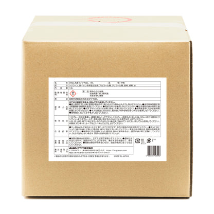 業務用の18L入り段ボール箱（バッグインボックス）の裏面に貼られた表示ラベル。名称 水なし洗車 ＆ ツヤ出し 18L、液性 中性、成分はシリコーン・非イオン系界面活性剤・アルコール類・グリコール類・香料・染料・水、内容量18L。危険有害性情報は「警告」で、飲み込むと有害・皮膚刺激・強い眼刺激・水生生物に毒性。用途 自動車塗装面の洗浄及びツヤ出し